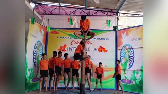 In the 75th Republic Day celebration at Omkar English Medium School, students sh…